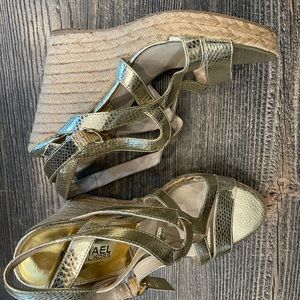 Michael Kors women’s Gold wedge shoes size 9.